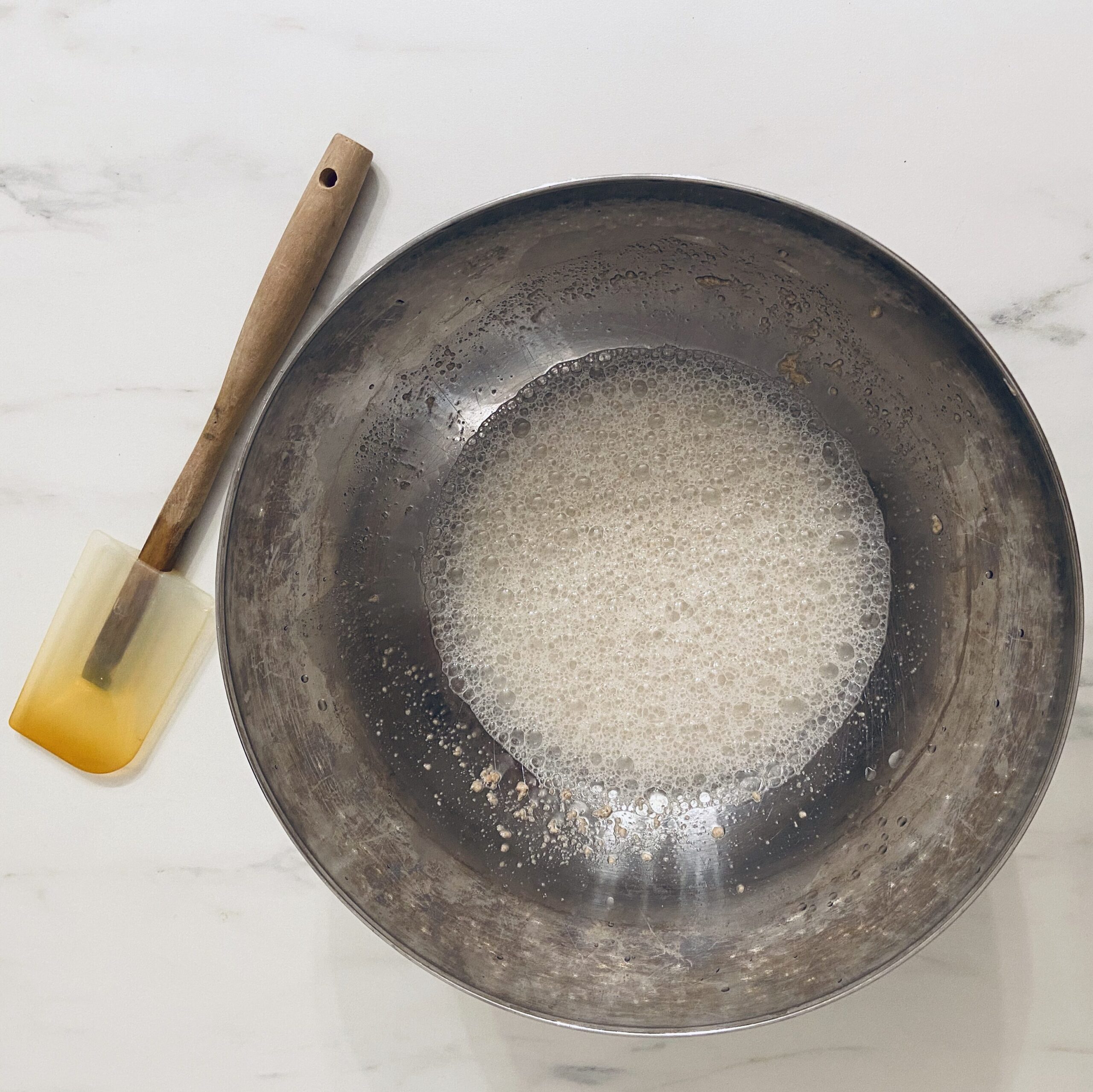 Water and Sourdough Starter mixed together before adding in dry ingredients. 