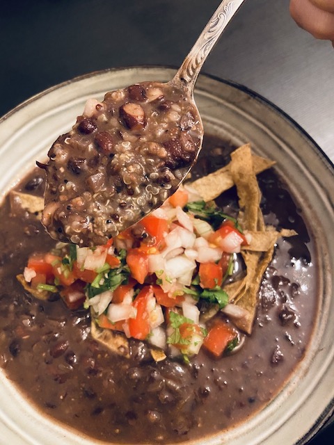 Vegan Mexican inspired black bean bean soup with fresh Pico de Gallo